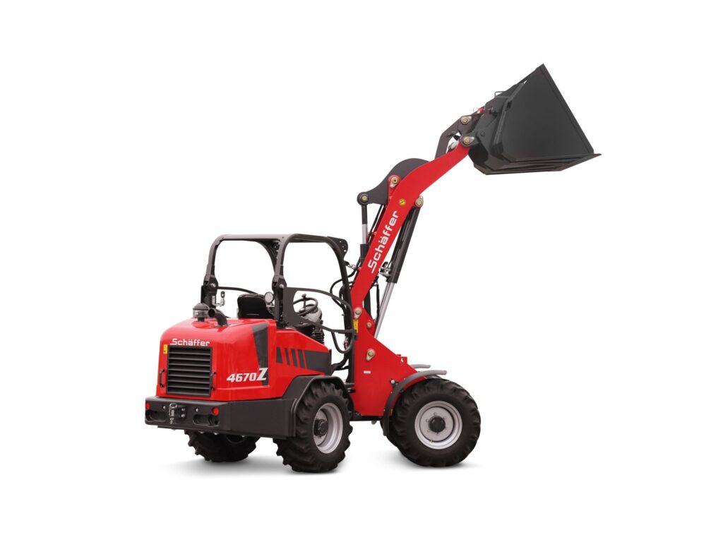 Schäffer 4670 Z-2 pyöräkuormaaja ilman taustaa puomi ylhäällä.