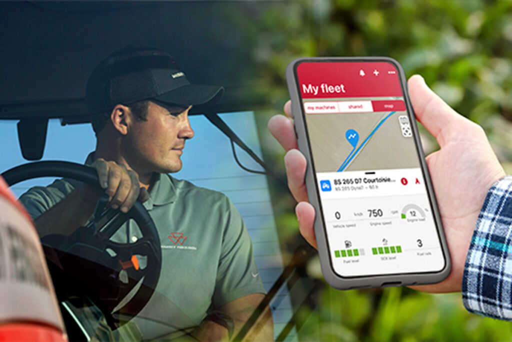 Henkilö ajamassa Massey Ferguson -traktoria ja hyödyntää MF Connect -sovellusta.